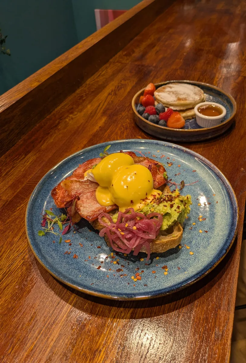 Eggs on toast served with coffee